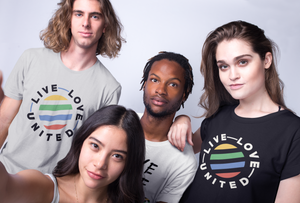 selfie of interracial friends wearing Live Love United (UNITY Collection) t-shirts against a white background